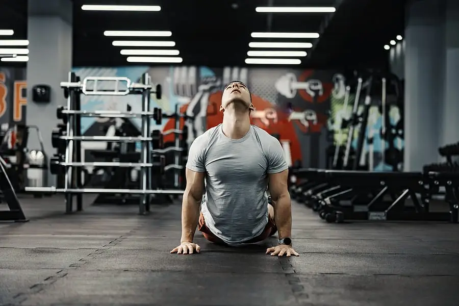 Man performing back extension exercise