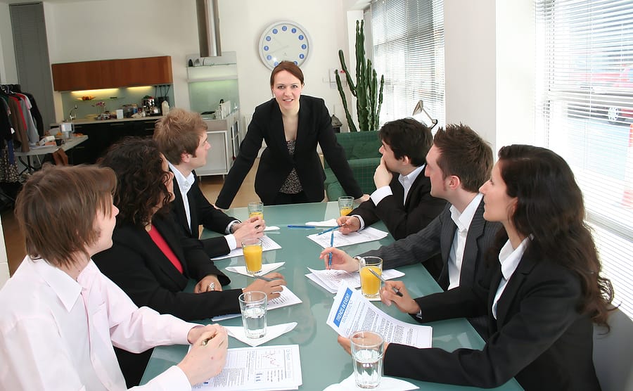 executive board meeting being led by a woman