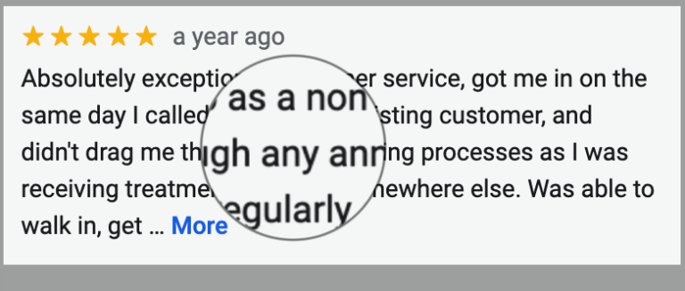 google review with magnifying glass hovering over